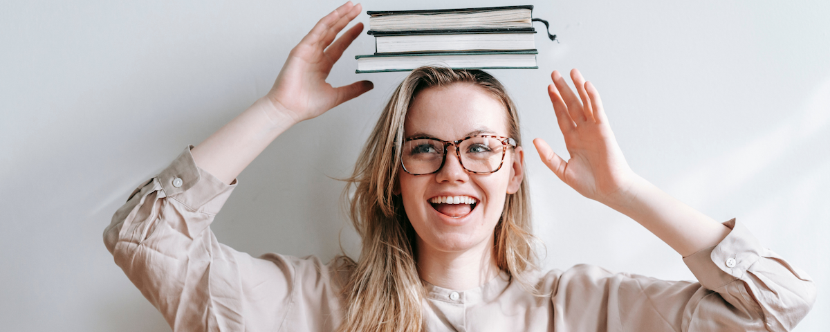SFU faculties and departments. Image: student with textbooks